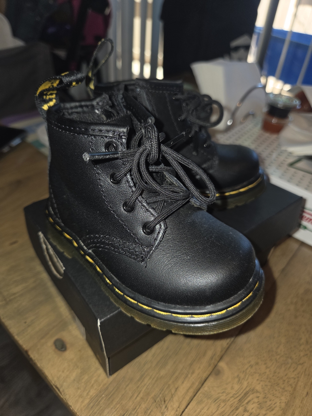 Dr. Martens Kids Black Leather Ankle Boots with Yellow Stitching